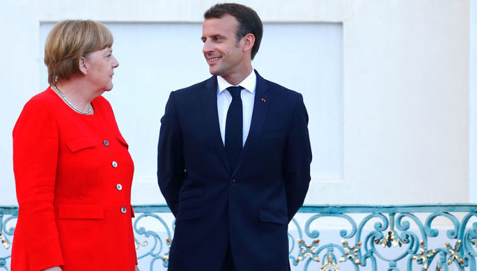 Канцлер Германии Ангела Меркель и президент Франции Эммануэль Макрон, 19 июня 2018 года