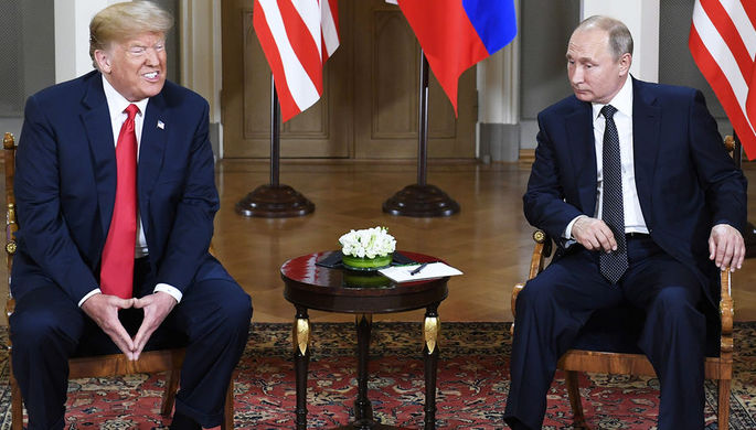 Президент США Дональд Трамп и президент России Владимир Путин во время встречи в Хельсинки, 16 июля...