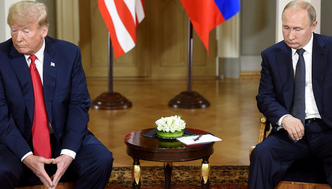 Президент США Дональд Трамп и президент России Владимир Путин во время встречи в Хельсинки, 16 июля...