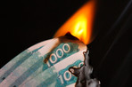 Рубль снизился на 51 копейку относительно доллара