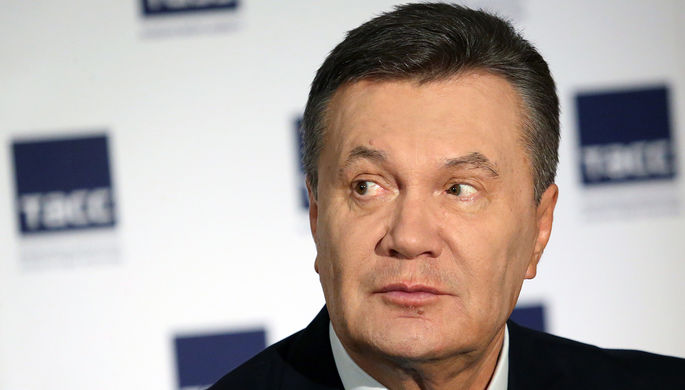Бывший президент Украины Виктор Янукович во время заявления об отказе от участия в проходящем в...