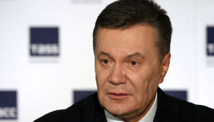 Бывший президент Украины Виктор Янукович во время заявления об отказе от участия в проходящем в...