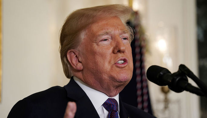 Президент США Дональд Трамп в Белом доме во время заявления о нанесении ударов по целям в Сирии, 14...