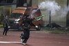 Один из фанатов, выскочивших к полю