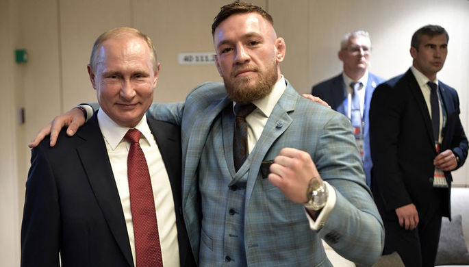 Президент России Владимир Путин и ирландский боец без правил Конор МакГрегор, 15 июля 2018 года