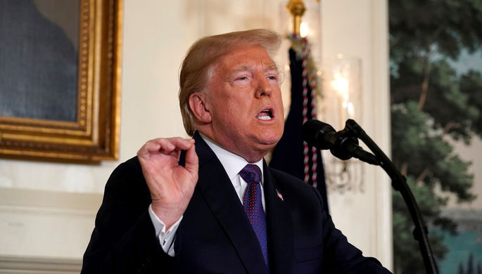 Президент США Дональд Трамп в Белом доме во время заявления о нанесении ударов по целям в Сирии, 14...