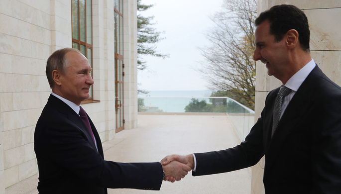 Президент России Владимир Путин и президент Сирии Башар Асад во время встречи в Сочи, 20 ноября 2017...