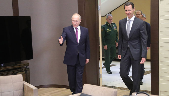 Президент России Владимир Путин и президент Сирии Башар Асад во время встречи в Сочи, 20 ноября 2017...