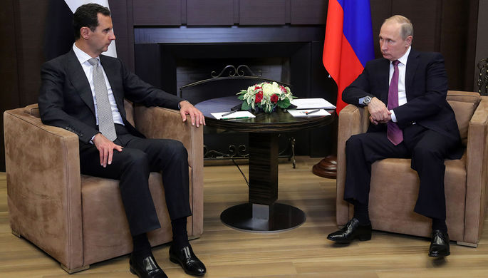 Президент Сирии Башар Асад и президент России Владимир Путин во время встречи в Сочи, 20 ноября 2017...