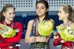 Призеры чемпионата России по фигурному катанию в Сочи в женском одиночном катании на церемонии награждения, 2013 год<br><br>
Юлия Липницкая с серебром, Аделина Сотникова с золотом, и Елена Радионова с бронзой