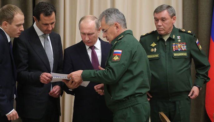 Президент России Владимир Путин, министр обороны Сергей Шойгу и глава Генштаба Валерий Герасимов во...