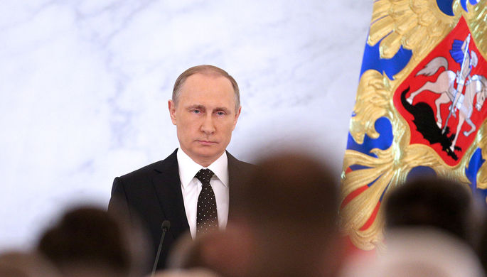 Президент России Владимир Путин во время выступления с ежегодным посланием к Федеральному собранию...