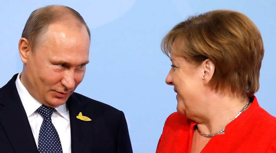 Президент России Владимир Путин и канцлер ФРГ Ангела Меркель во время саммита G20 в Гамбурге, июль 2017 года