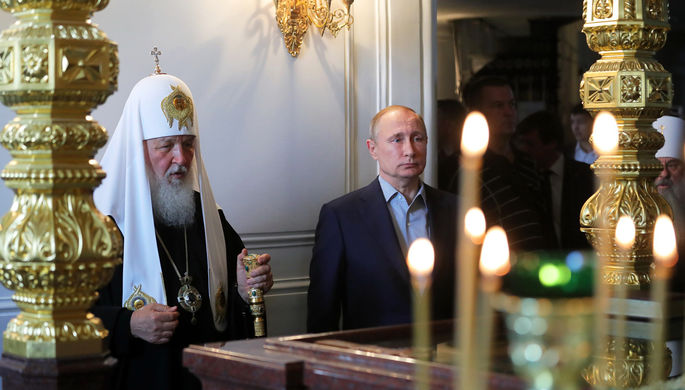 Патриарх Московский и всея Руси Кирилл и президент России Владимир Путин во время посещения...