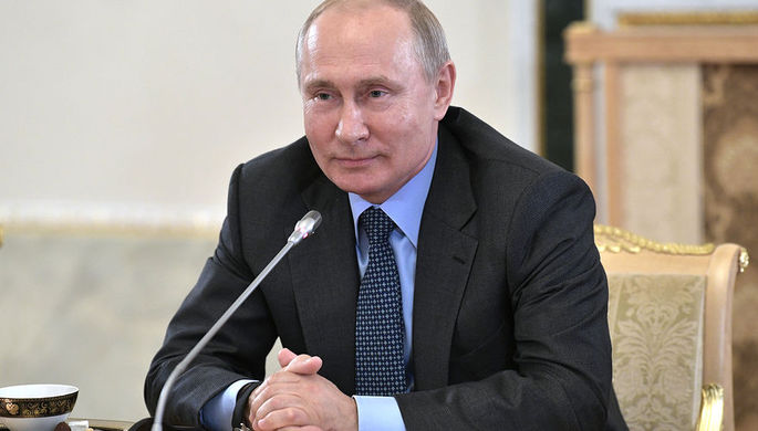 Президент России Владимир Путин во время встречи с руководителями информагентств в рамках...