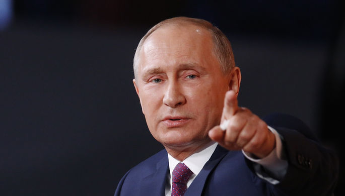 Президент России Владимир Путин во время ежегодной пресс-конференции в Москве, 14 декабря 2017 года