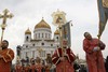 People started approaching the main Russian Orthodox Church Cathedral at 11 a.m. on Sunday. Groups...