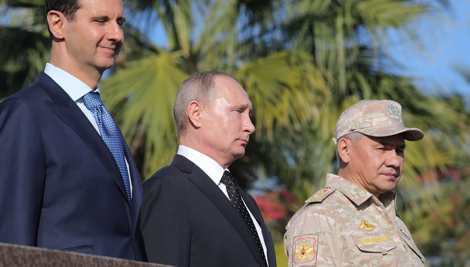 Президент Сирии Башар Асад, президент России Владимир Путин и министр обороны России Сергей Шойгу...