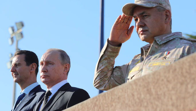 Президент Сирии Башар Асад, президент России Владимир Путин и министр обороны России Сергей Шойгу...