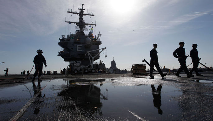 Подготовка авианосца USS Enterprise к последнему плаванию на базе Норфолк, штат Виргиния, март 2012...