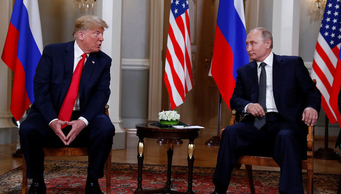 Президент США Дональд Трамп и президент России Владимир Путин во время встречи в Хельсинки, 16 июля...