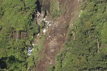Indonesian rescue team reach crash site, 14 bodies found, evacuated on foot
