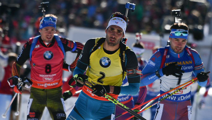 Слева направо: биатлонисты Симон Шемпп, Мартен Фуркад и Антон Шипулин