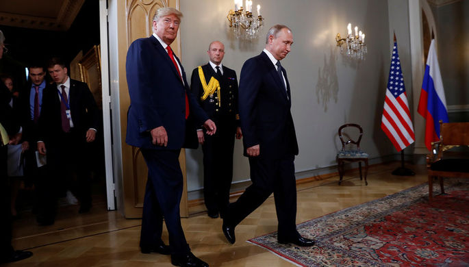 Президент США Дональд Трамп и президент России Владимир Путин во время встречи в Хельсинки, 16 июля...