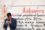 Посетитель на концерте, посвященном Дню славянской письменности, на Красной площади в Москве, 24 мая 2023 года