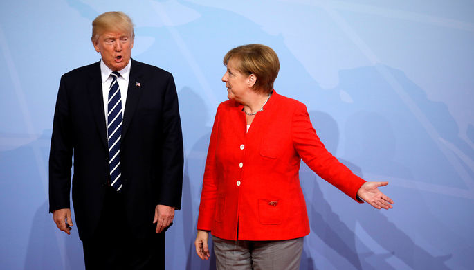 Президент США Дональд Трамп и канцлер Германии Ангела Меркель во время саммита G20 в Гамбурге, июль...