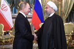 Владимир Путин и президент Ирана Хасан Роухани во время встречи в Кремле, 2017 год 