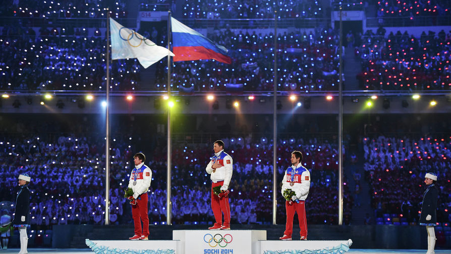 Призеры Олимпиады в Сочи Максим Вылегжанин, Александр Легков и Илья Черноусов (слева направо)