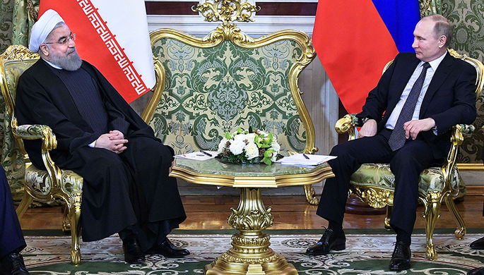 Президент Ирана Хасан Рухани и Владимир Путин во время встречи в Кремле