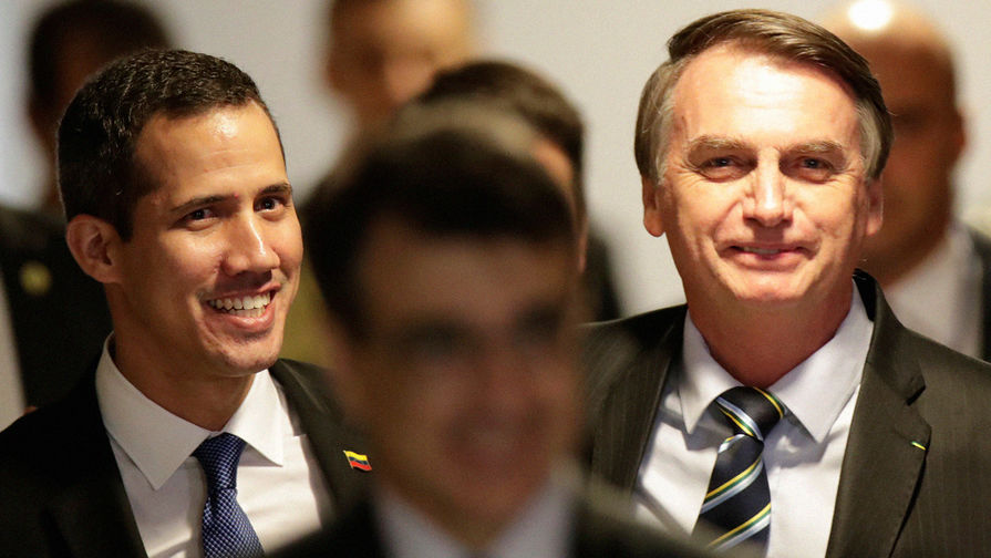 Лидер оппозиции Венесуэлы Хуан Гуайдо и президент Бразилии Жаир Болсонару во время встречи в Бразилии, февраль 2019 года