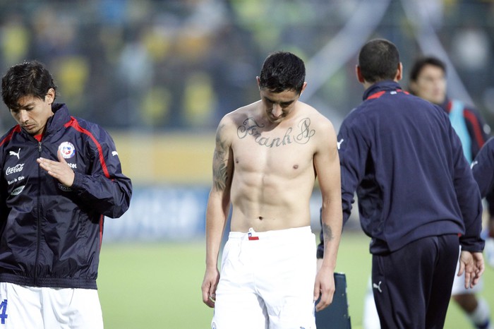 Расстроенные игроки сборной Чили после поражения от Эквадора