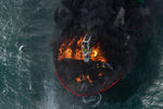 Пожар на контейнеровозе MV X-Press Pearl, перевозившем 25 тонн азотной кислоты, у берегов Шри-Ланки, 26 мая 2021 года