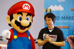 Главный управляющий директор Nintendo Сигэру Миямото представляет новую игру Mario Maker во время международной выставки E3 в Лос-Анджелесе, 2014 год