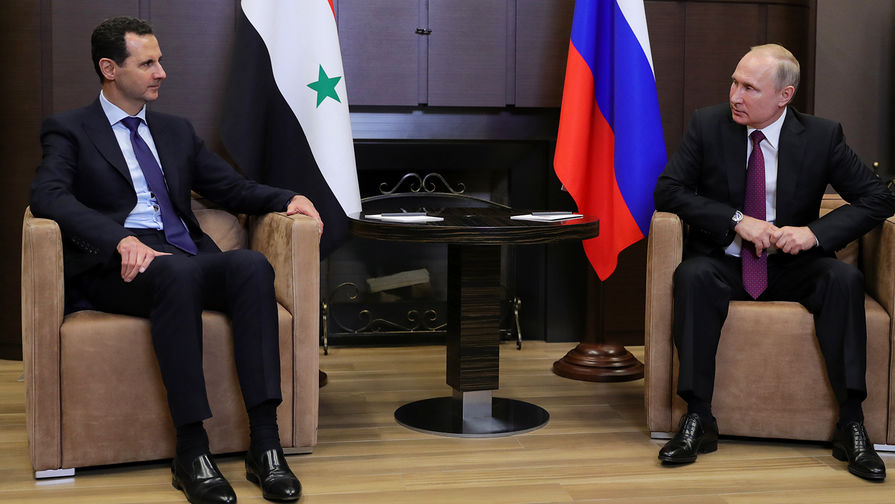 Президент России Владимир Путин и президент Сирийской арабской республики Башар Асад во время встречи в&nbsp;Сочи, 17 мая 2018 года