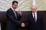 Президент Сирии Башар Асад и президент России Владимир Путин и во время встречи в Сочи, 21 ноября 2017 года