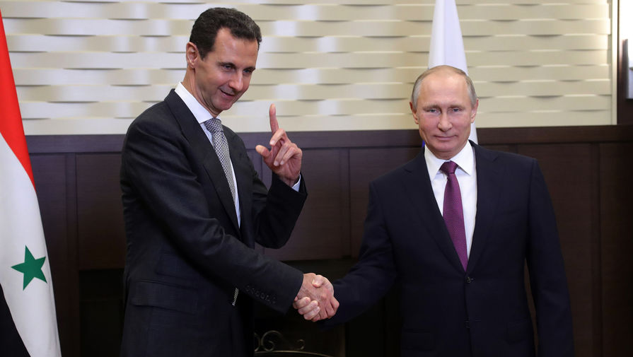 Президент Сирии Башар Асад и президент России Владимир Путин и во время встречи в Сочи, 21 ноября 2017 года