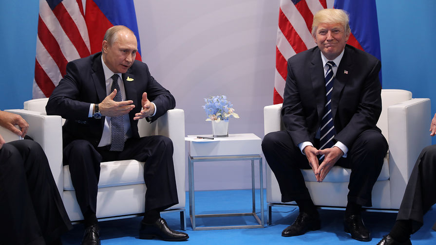 Президент России Владимир Путин и президент США Дональд Трамп во время встречи на полях саммита G20 в Гамбурге, 7 июля 2017 года