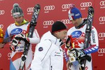 Дмитрий Медведев на фоне победителя швейцарца Беата Фойца и третьего призера француза Адриен Тео (справа)