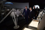 Вице-премьер России Дмитрий Рогозин, президент Владимир Путин и мэр Москвы Сергей Собянин во время посещения реконструированного павильона «Космос» на ВДНХ, 12 апреля 2018 года