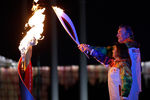 Хоккеист Владислав Третьяк и фигуристка Ирина Роднина во время церемонии зажжения олимпийского огня на Олимпиаде в Сочи, 2014 год