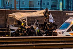 Последствия аварии с участием самосвала и военных автобусов на 28-м километре Новорижского шоссе в Подмосковье, 11 января 2021 года