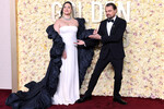 Актриса Лили Глэдстоун и актер Леонардо ДиКаприо на церемонии вручения премии «Золотой глобус», 8 января 2023 года