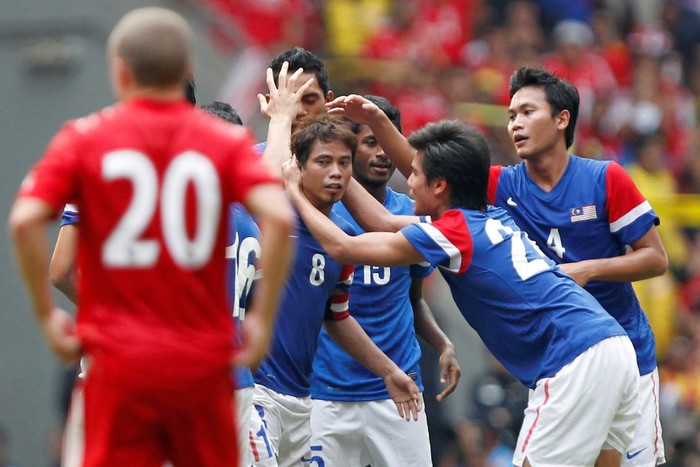 Малазийцы отмечают гол в&nbsp;ворота &laquo;Ливерпуля&raquo;