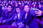 Комики Азамат Мусагалиев, Денис Дорохов и Марина Кравец (слева направо) на шоу в честь 25-летия телеканала ТНТ, 2023 год 