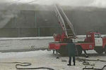 Тушение пожара на складе автозапчастей на улице Калинина в Красноярске, 3 февраля 2021 года