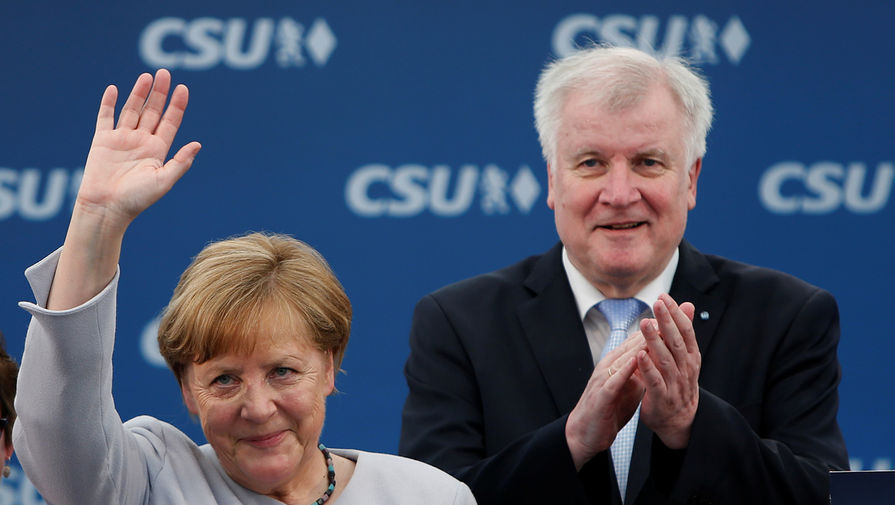 Меркель и глава МВД ФРГ обсудили решение ЕС по мигрантам